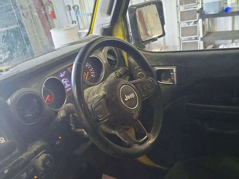 2023 Jeep Wrangler / VIN 1C4HJXKN3PW611892 COPART salvage auction — NORMAL WEAR, Ia - Certificate Of Title (P), sold $12,800 on 2026-08-07 (photo 9)