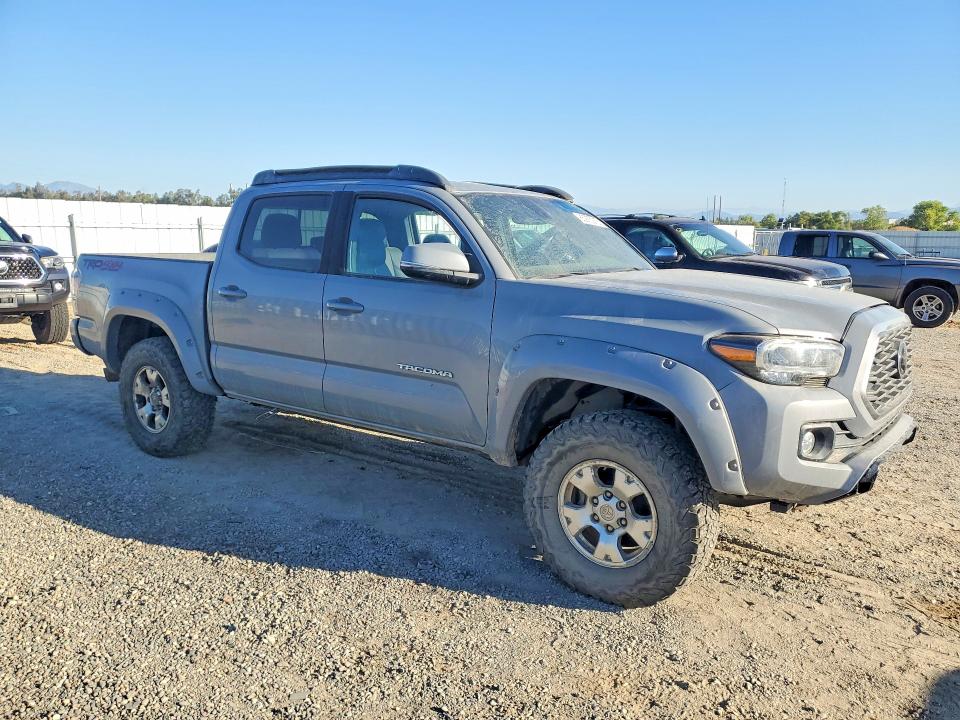2021 Toyota Tacoma VIN 3TYCZ5AN2MT015925 COPART salvage auction — ROLLOVER, Ca - Salvage Certificate, sold $15,100 on 2026-07-31 (photo 4)