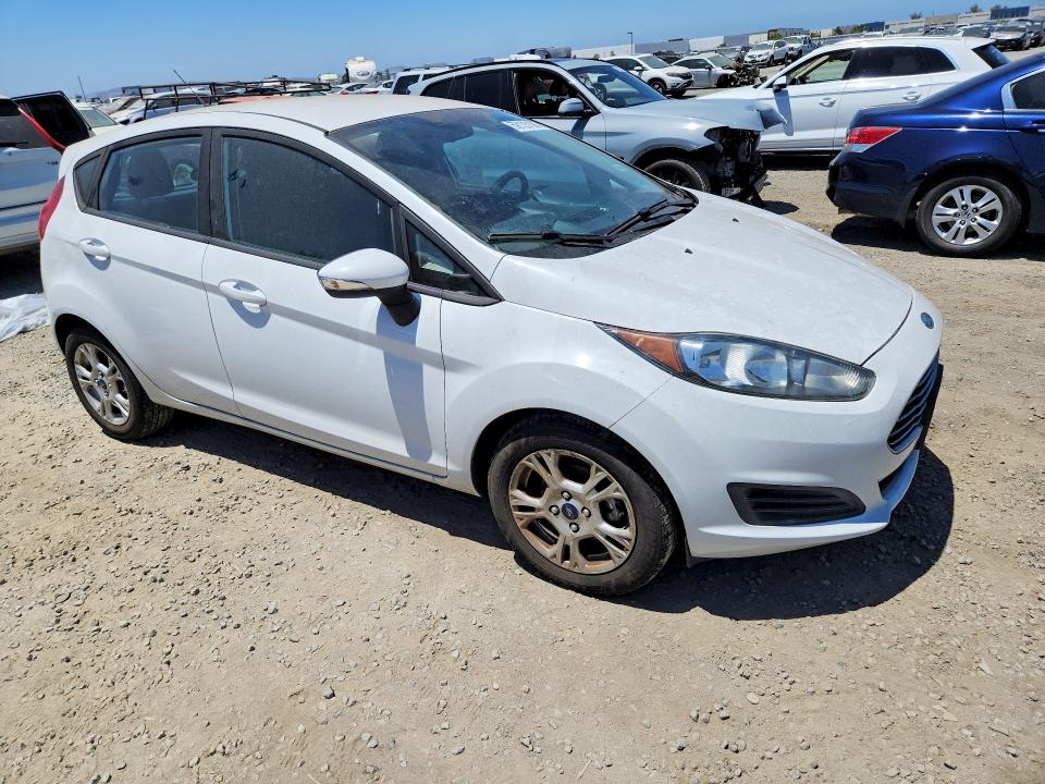 2014 Ford Fiesta VIN 3FADP4EJ1EM121636 COPART salvage auction — MINOR DENT/SCRATCHES, Ca - Dis/Dlr/Exp Only Clean Title, sold $300 on 2026-07-10 (photo 4)