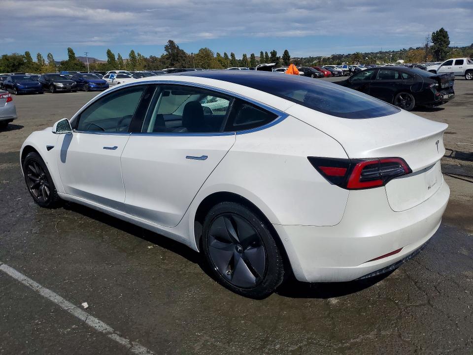 2018 Tesla Model 3 VIN 5YJ3E1EA1JF013218 COPART salvage auction — MINOR DENT/SCRATCHES, Ca - Certificate Of Title, sold $17,007 on 2026-09-01 (photo 2)