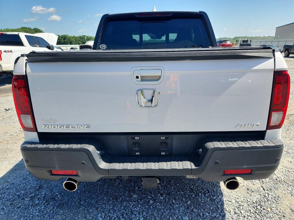 2023 Honda Ridgeline VIN 5FPYK3F86PB006559 COPART salvage auction — SIDE, Nc - Salvage Certificate Of Title, sold $16,600 on 2026-08-19 (photo 6)