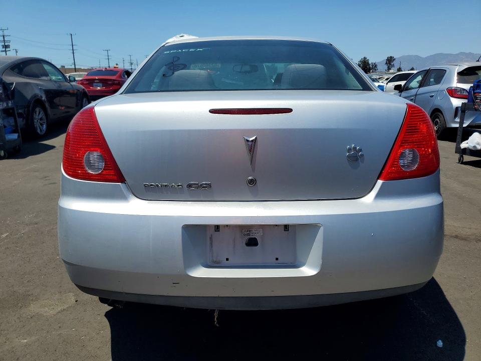 2009 Pontiac G6 VIN 1G2ZG57B494151263 COPART salvage auction — MINOR DENT/SCRATCHES, Ca - Dis/Dlr/Exp Clean W/Salv Hist, sold $225 on 2026-07-27 (photo 6)
