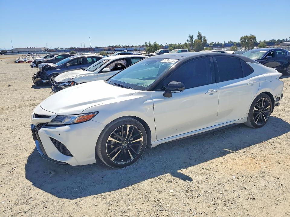 2018 Toyota Camry VIN 4T1B61HK8JU106253 COPART salvage auction — REAR END, Ca - Salvage Certificate, sold $9,800 on 2026-07-30 (photo 1)