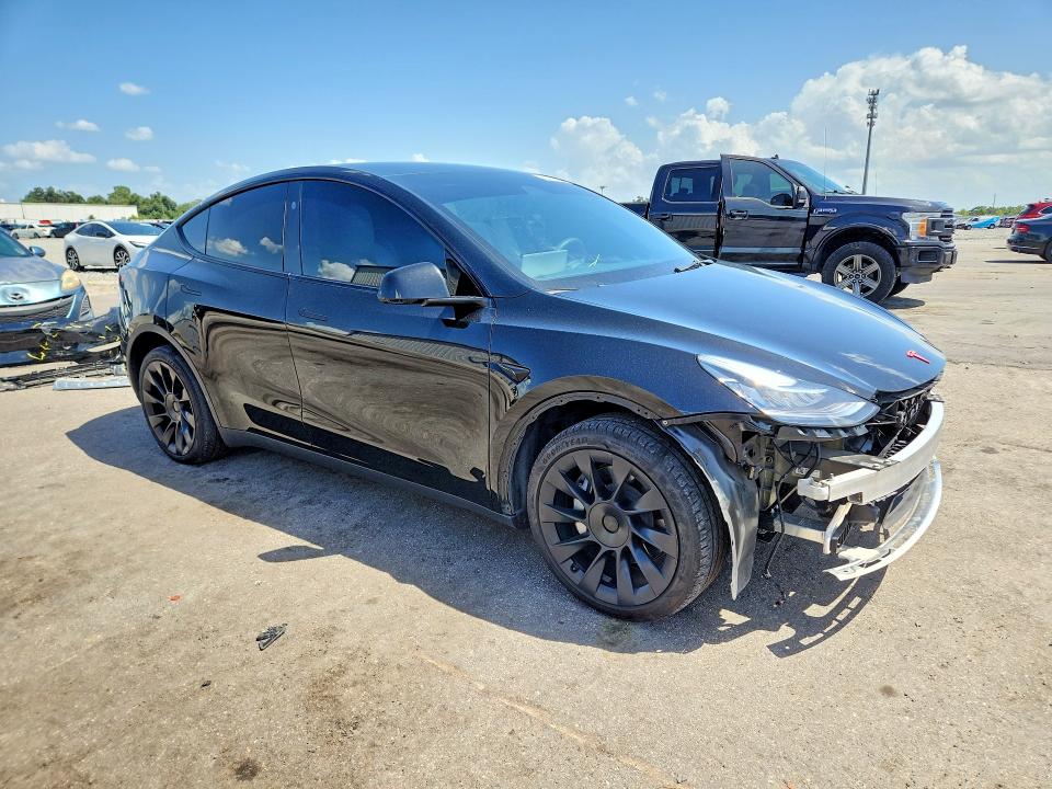 2023 Tesla Model y VIN 7SAYGDEE7PA141797 COPART salvage auction — FRONT END, Fl - Cert Of Title Slvg Rebuildable, sold $15,500 on 2026-08-03 (photo 4)