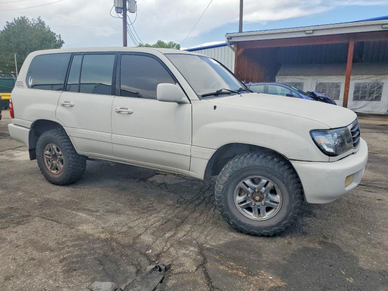 2000 Toyota Land cruiser VIN JT3HT05J2Y0096774 COPART salvage auction — MINOR DENT/SCRATCHES, Co - Dis/Dlr/Exp Only Clean Title, sold $275 on 2026-07-28 (photo 4)