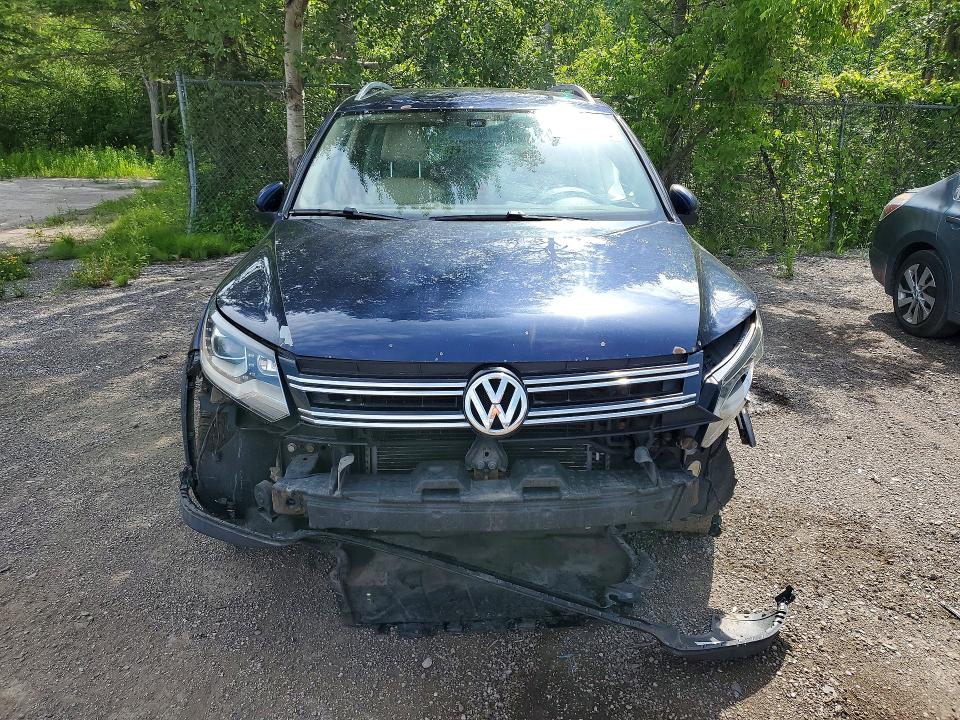 2012 Volkswagen Tiguan VIN WVGBV7AX5CW599621 COPART salvage auction — REAR END, ON - PERMIT NO BRAND - UNFIT, sold $300 on 2026-07-23 (photo 5)