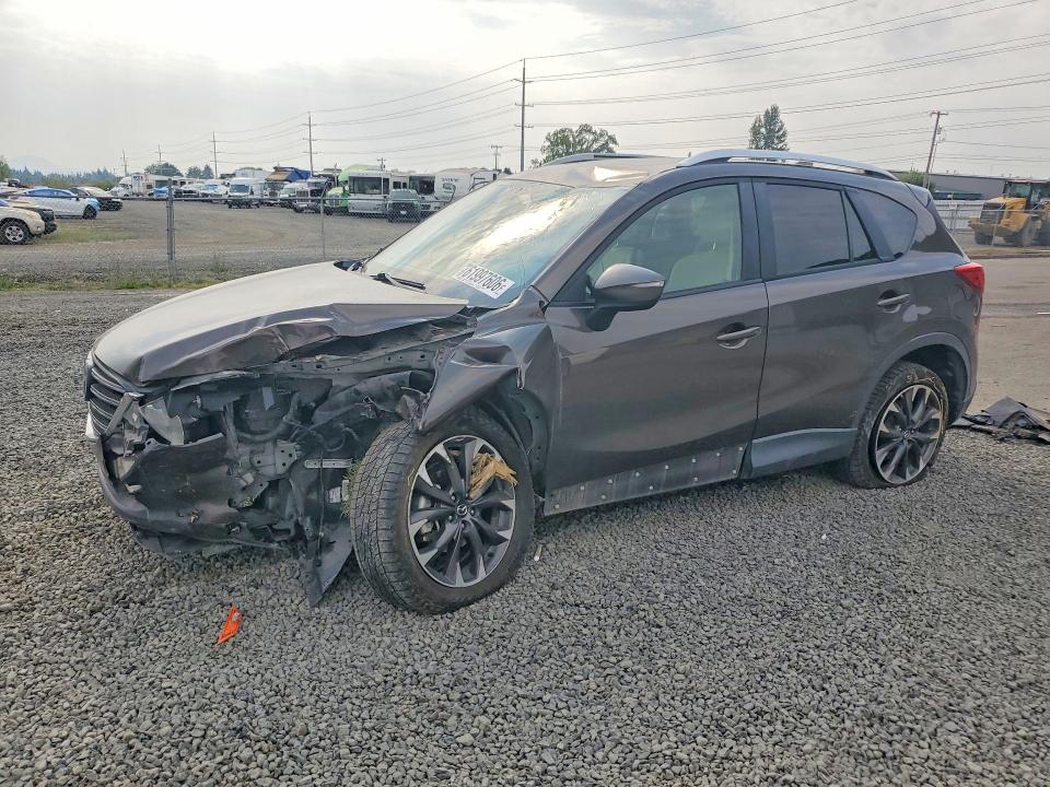 2016 Mazda Cx-5 VIN JM3KE4DY3G0909871 COPART salvage auction — SIDE, Or - Salvage Title Certificate, sold $1,600 on 2026-09-08 (photo 1)