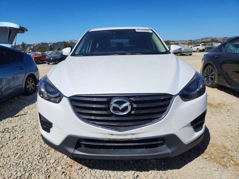 2016 Mazda Cx-5 VIN JM3KE2DY8G0872224 COPART salvage auction — SIDE, Ca - Salvage Certificate, sold $825 on 2026-07-23 (photo 5)
