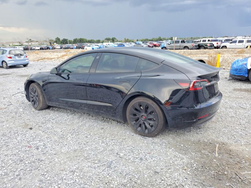 2023 Tesla Model 3 VIN 5YJ3E1EA9PF691269 COPART salvage auction — REAR END, Fl - Certificate Of Destruction, sold $8,300 on 2026-07-28 (photo 2)