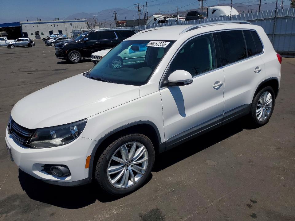 2012 Volkswagen Tiguan VIN WVGAV7AX5CW606224 COPART salvage auction — MINOR DENT/SCRATCHES, Ca - Dis/Dlr/Exp Only Clean Title (P), sold $600 on 2026-07-22 (photo 1)