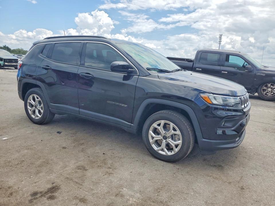2025 Jeep Compass VIN 3C4NJDBN8ST588206 COPART salvage auction — SIDE, Fl - Cert Of Title Slvg Rebuildable, sold $7,900 on 2026-08-14 (photo 4)