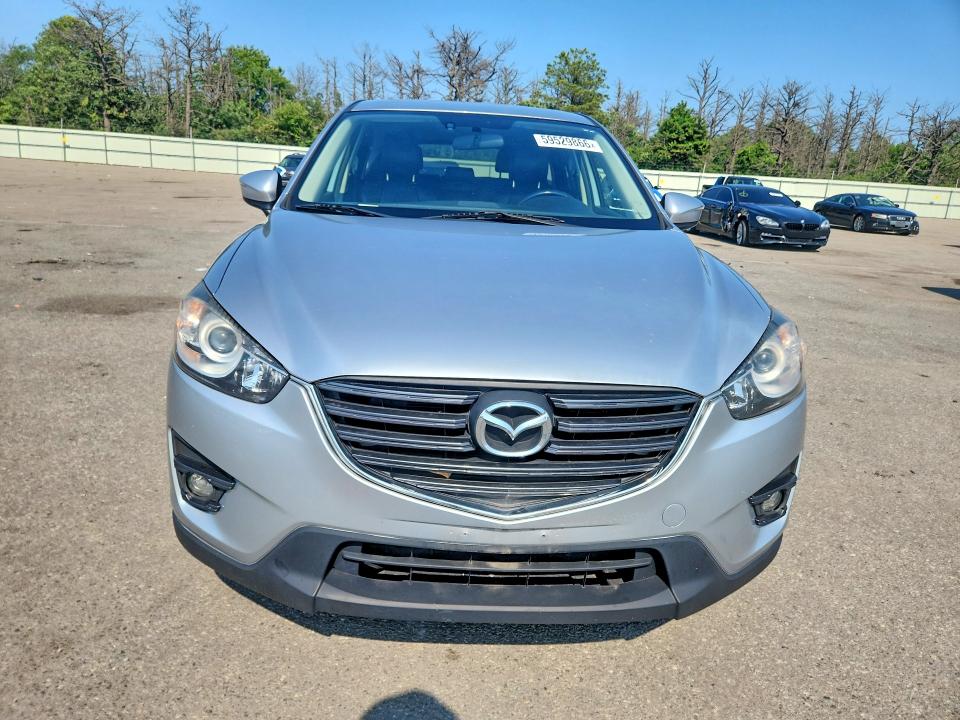 2016 Mazda Cx-5 VIN JM3KE4DY1G0713671 COPART salvage auction — REAR END, NY - MV-907A SALVAGE CERTIFICATE, sold $3,900 on 2026-07-20 (photo 5)