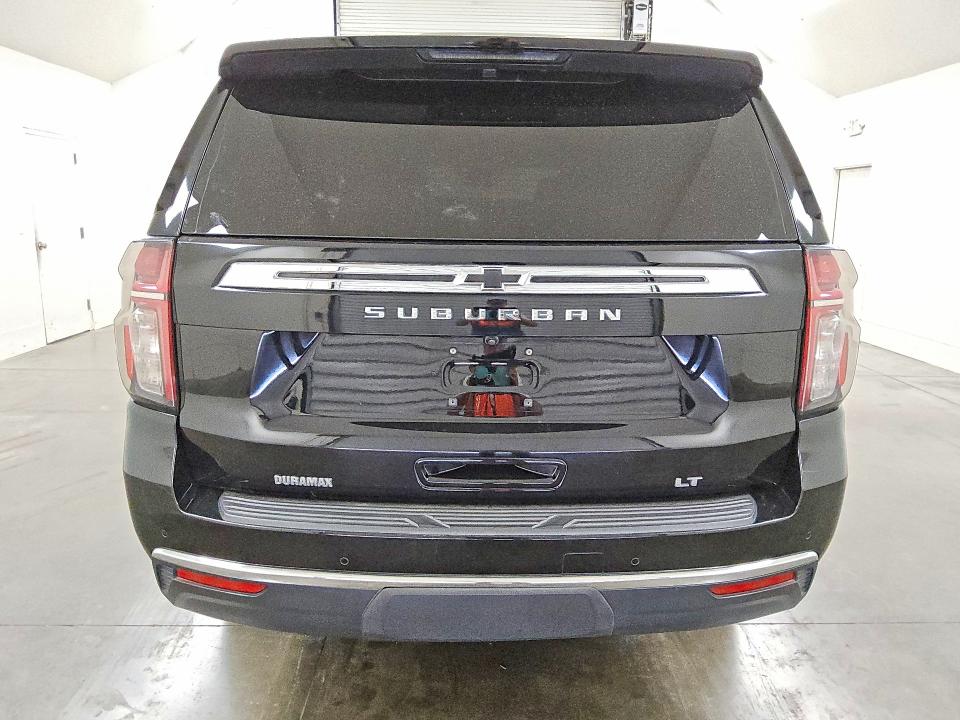 2023 Chevrolet Suburban VIN 1GNSCCKT3PR197820 COPART salvage auction — MINOR DENT/SCRATCHES, TX - CERTIFICATE OF TITLE, sold $25,000 on 2026-08-27 (photo 6)