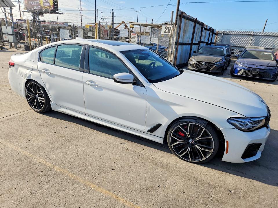 2023 BMW M5 VIN WBA13BK06PCM40203 COPART salvage auction — REAR END, CA - DIS/DLR/EXP ONLY CLEAN TITLE, sold $20,600 on 2026-07-29 (photo 4)