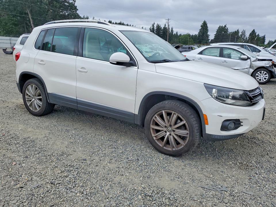 2012 Volkswagen Tiguan VIN WVGBV7AX8CW581906 COPART salvage auction — MINOR DENT/SCRATCHES, Wa - Vehicle Cert Of Ownership-Titl, sold $1,000 on 2026-07-14 (photo 4)
