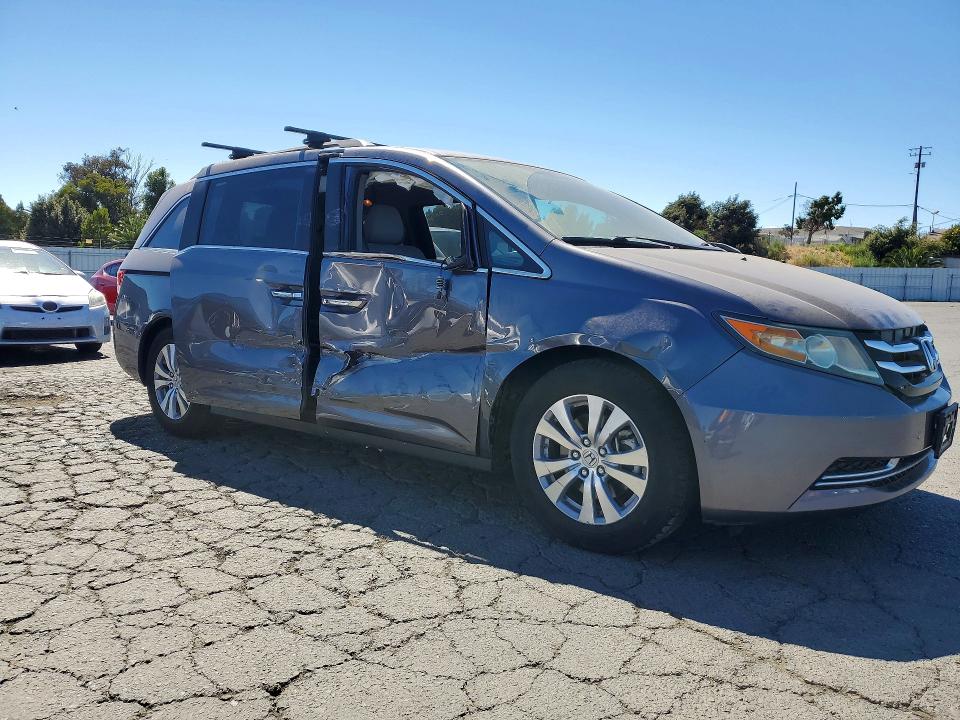 2015 Honda Odyssey VIN 5FNRL5H42FB101649 COPART salvage auction — SIDE, Salvage Title, sold $5,300 on 2026-07-10 (photo 4)