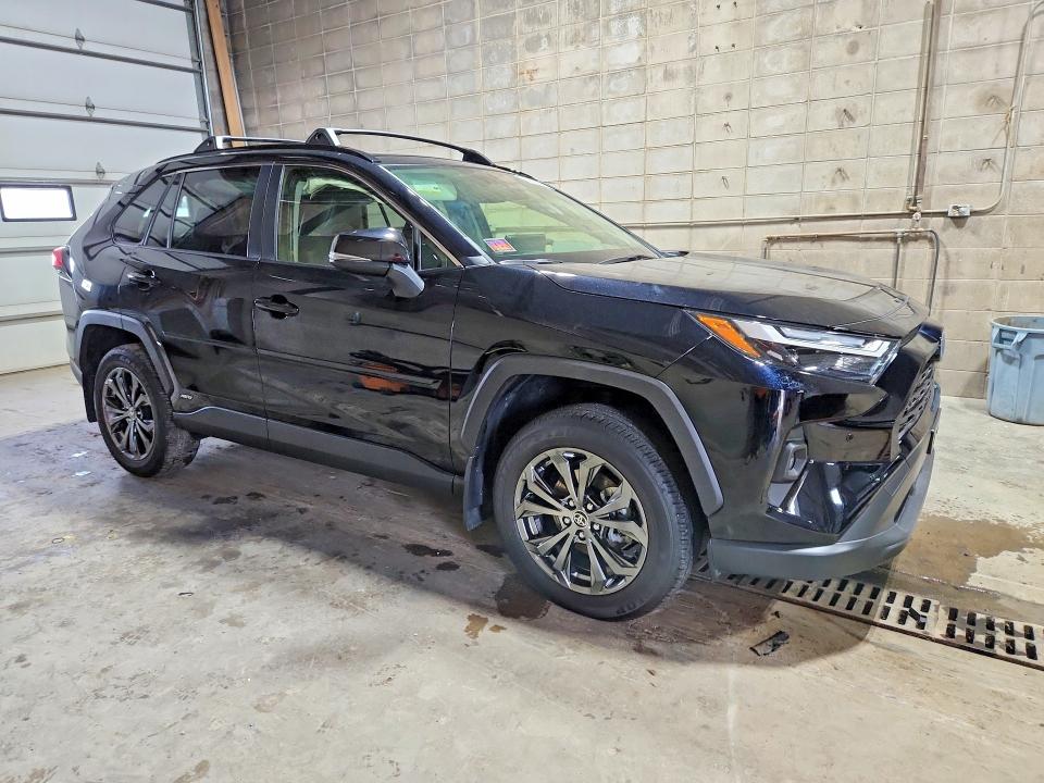 2024 Toyota Rav 4 VIN JTMB6RFV8RD122397 COPART salvage auction — SIDE, Mn - Cert Of Title-Salvage, sold $16,600 on 2026-07-14 (photo 4)