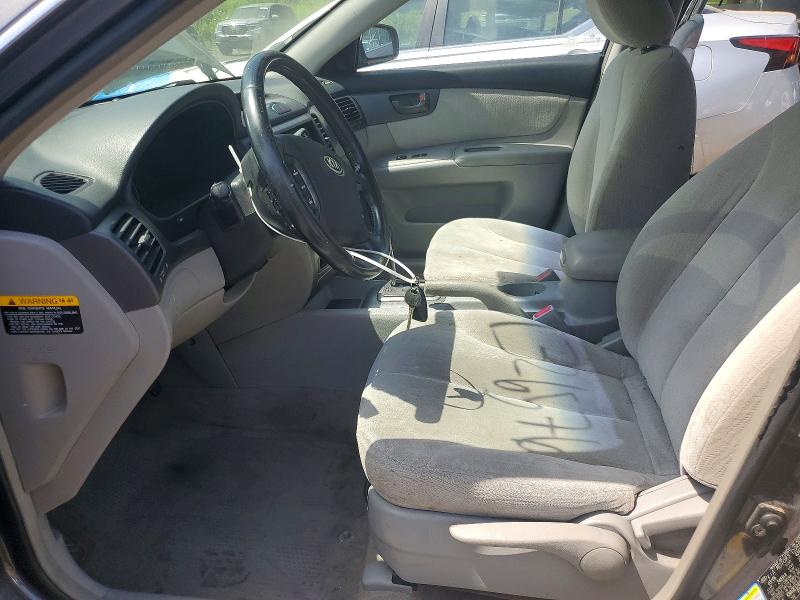 2006 Kia Optima VIN KNAGE124965039832 COPART salvage auction — SIDE, Nc - Salvage Certificate Of Title, sold $125 on 2026-07-30 (photo 7)
