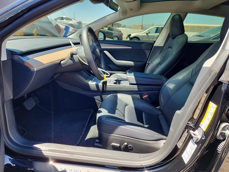2023 Tesla Model 3 VIN 5YJ3E1EA7PF698947 COPART salvage auction — NORMAL WEAR, Ca - Salvage Certificate (P), sold $13,700 on 2026-07-24 (photo 7)