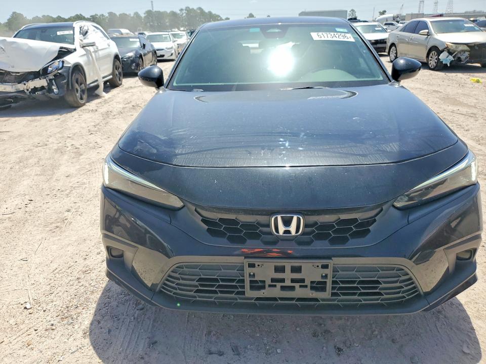 2024 Honda Civic VIN 19XFL2H87RE037915 COPART salvage auction — ROOF, Tx - Salvage Vehicle Title, sold $7,000 on 2026-08-25 (photo 5)