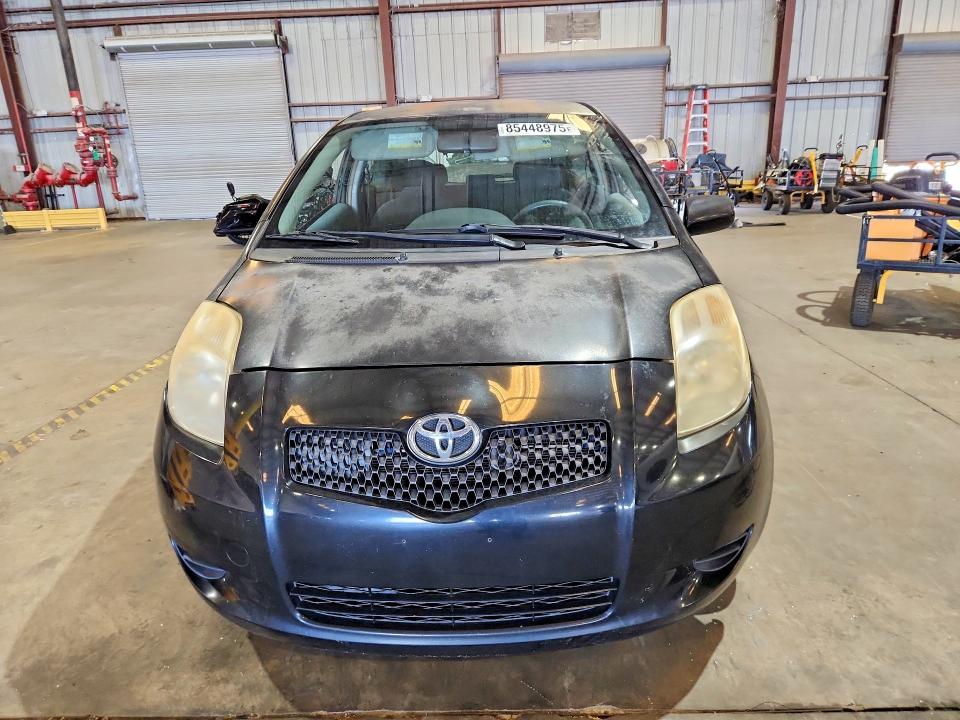 2008 Toyota Yaris VIN JTDJT923585219977 COPART salvage auction — SIDE, Fl - Cert Of Title Slvg Rebuildable, sold $975 on 2026-07-27 (photo 5)
