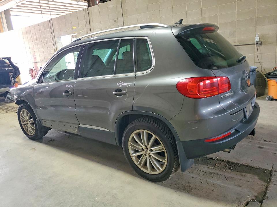 2014 Volkswagen Tiguan VIN WVGBV3AX1EW536530 COPART salvage auction — FRONT END, MN - CERT OF TITLE-PRIOR SALVAGE, sold $525 on 2026-08-06 (photo 2)