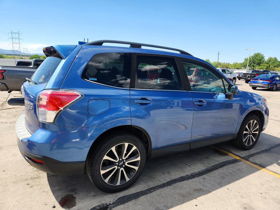 2017 Subaru Forester VIN JF2SJGEC5HH800390 COPART salvage auction — HAIL, CO - CERTIFICATE OF TITLE, sold $4,000 on 2026-08-19 (photo 3)
