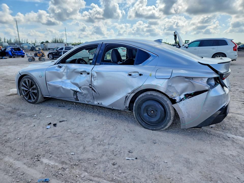 2021 Lexus Is VIN JTHGZ1B22M5037809 COPART salvage auction — SIDE, Fl - Cert Of Title Slvg Rebuildable, sold $13,500 on 2026-07-14 (photo 2)