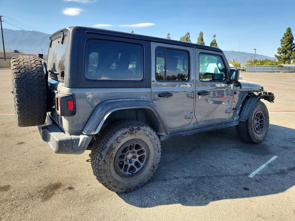 2023 Jeep Wrangler / VIN 1C4HJXDG9PW588410 COPART salvage auction — FRONT END, Ca - Salvage Certificate, sold $15,300 on 2026-09-01 (photo 3)