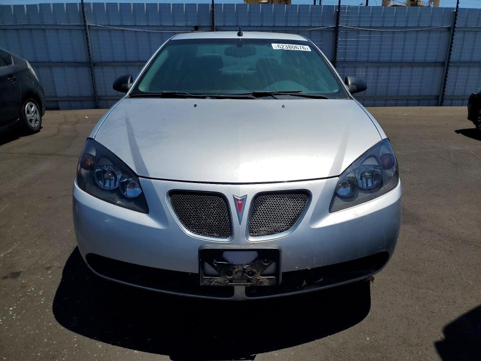2009 Pontiac G6 VIN 1G2ZG57B494151263 COPART salvage auction — MINOR DENT/SCRATCHES, Ca - Dis/Dlr/Exp Clean W/Salv Hist, sold $225 on 2026-07-27 (photo 5)