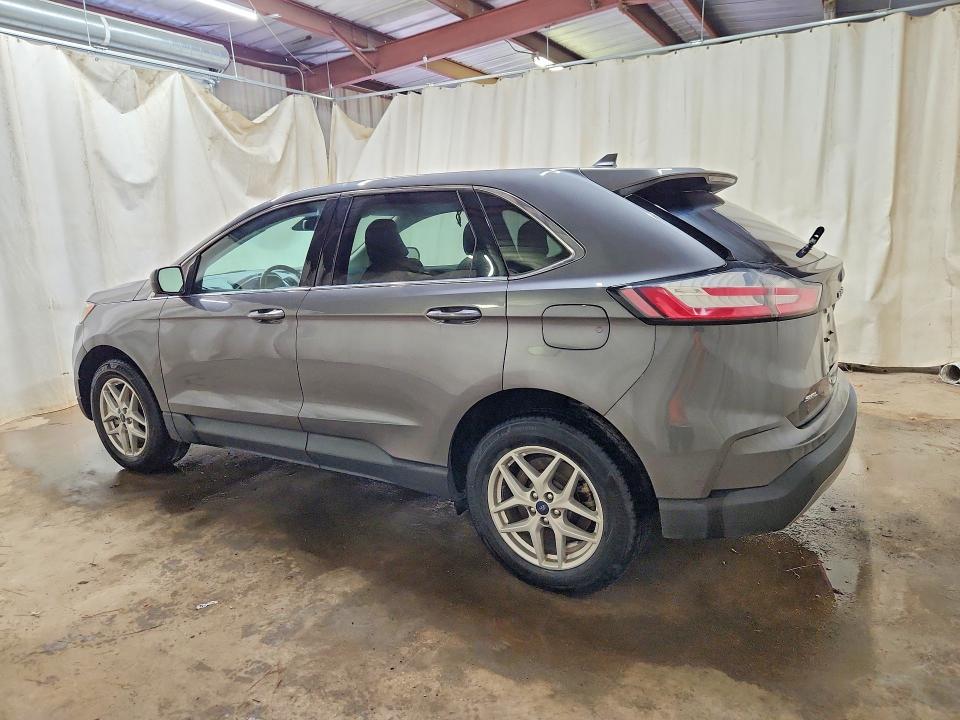 2021 Ford Edge VIN 2FMPK4J90MBA54167 COPART salvage auction — MINOR DENT/SCRATCHES, La - Certificate Of Title, sold $8,300 on 2026-07-28 (photo 2)