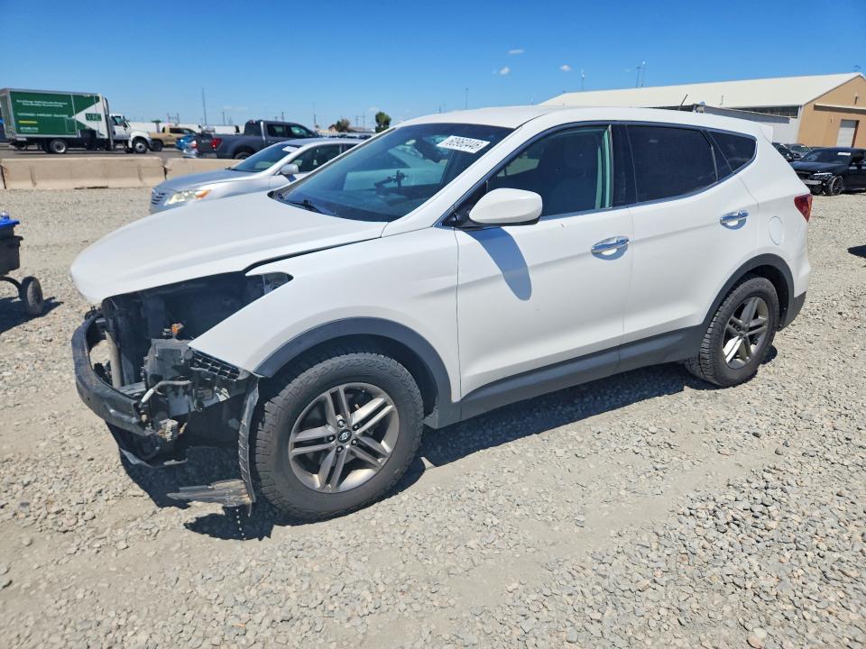 2018 Hyundai Santa fe VIN 5XYZTDLB2JG557216 COPART salvage auction — FRONT END, Co - Salvage Title, sold $750 on 2026-07-28 (photo 1)