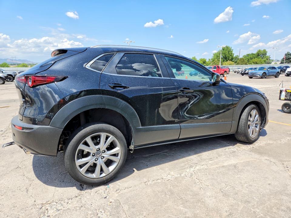 2023 Mazda Cx-30 VIN 3MVDMBBM1PM524197 COPART salvage auction — SIDE, Co - Public - Salvage Title, sold $3,250 on 2026-09-02 (photo 3)