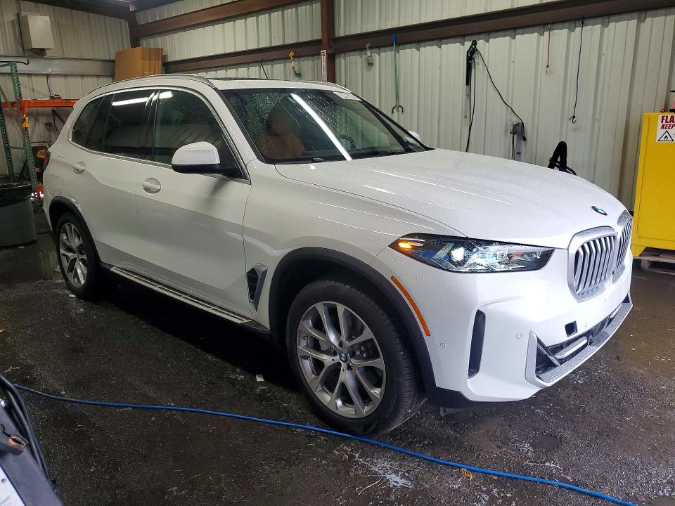 2026 BMW X5 VIN 5UX23EU09T9385953 COPART salvage auction — UNDERCARRIAGE, Ny - Certificate Of Title, sold $41,250 on 2026-07-20 (photo 4)