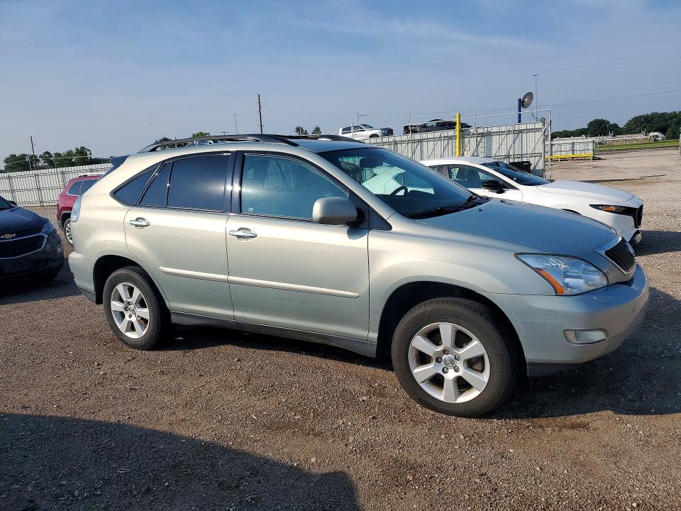 2009 Lexus Rx VIN 2T2HK31U09C115860 COPART salvage auction — NORMAL WEAR, Ia - Certificate Of Title, sold $2,000 on 2026-07-24 (photo 4)