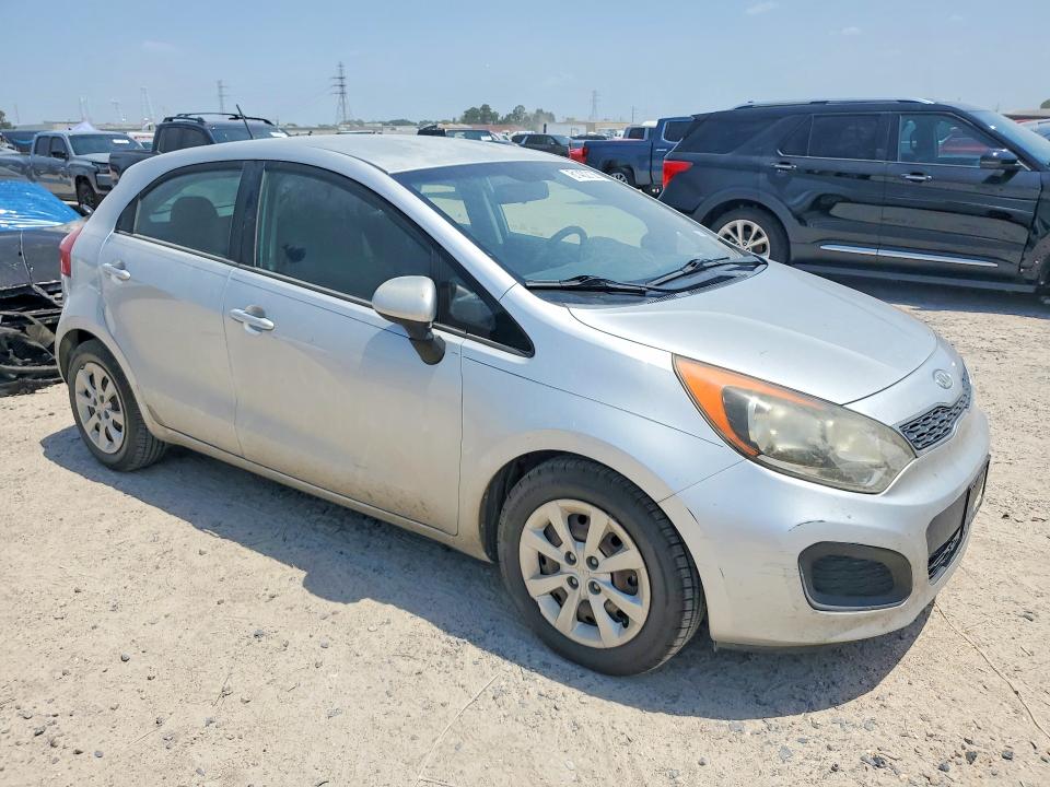 2012 Kia Rio VIN KNADN5A34C6024664 COPART salvage auction — NORMAL WEAR, Tx - Certificate Of Title, sold $250 on 2026-07-24 (photo 4)