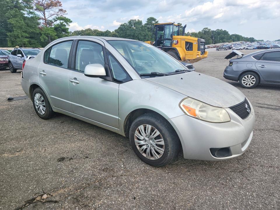 2011 Suzuki Sx4 VIN JS2YC5A26B6300770 COPART salvage auction — MINOR DENT/SCRATCHES, Al - Cert Of Title-Salvage Title, sold $225 on 2026-09-28 (photo 4)