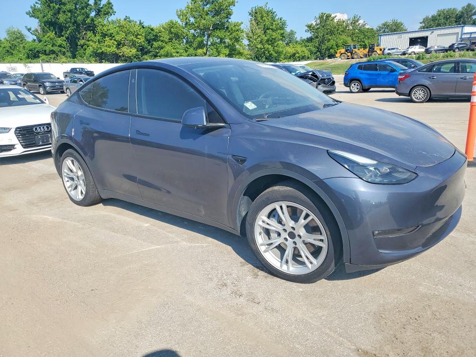 2023 Tesla Model y VIN 7SAYGDED5PF960706 COPART salvage auction — NORMAL WEAR, Mo - Certificate Of Title, sold $15,000 on 2026-07-31 (photo 4)