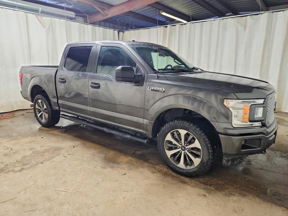 2019 Ford F-150 lightning VIN 1FTEW1E57KKE33966 COPART salvage auction — MINOR DENT/SCRATCHES, Tx - Certificate Of Title, sold $8,700 on 2026-07-30 (photo 4)