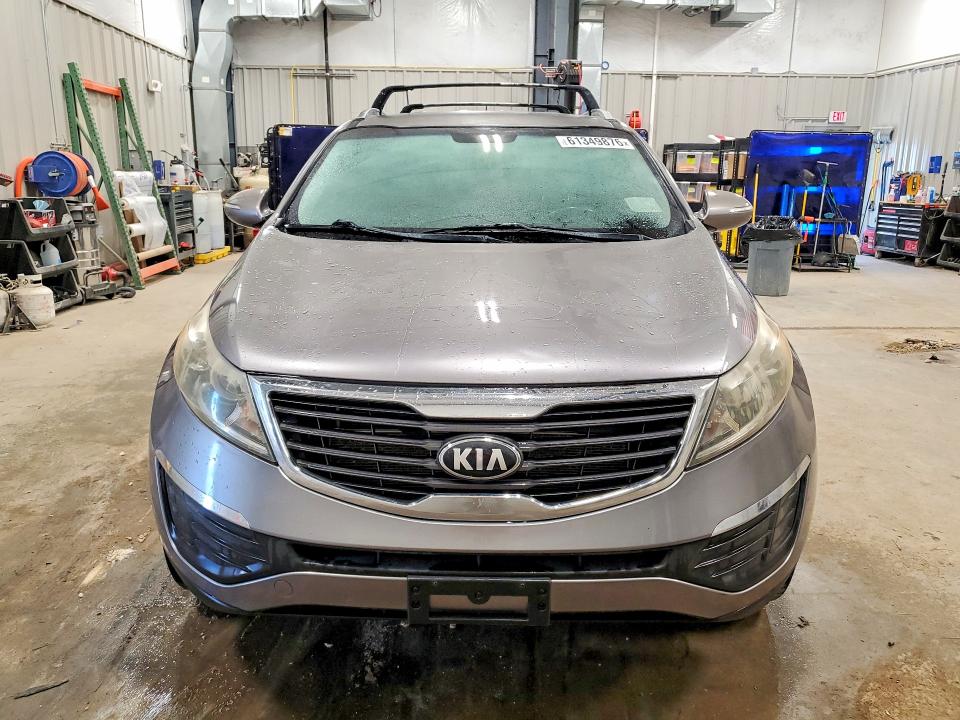 2013 Kia Sportage VIN KNDPBCA22D7401797 COPART salvage auction — NORMAL WEAR, Wy - Certificate Of Title, sold $1,200 on 2026-07-29 (photo 5)