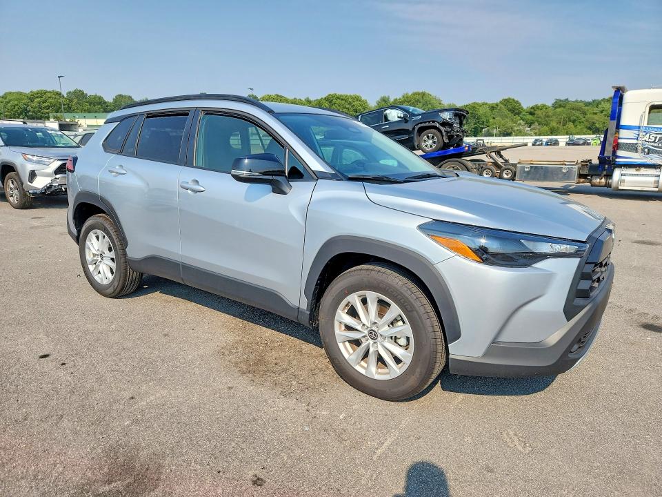 2026 Toyota Corolla cross VIN 7MUCAAAG8TV201129 COPART salvage auction — SIDE, MA - CERTIFICATE OF TITLE, sold $7,300 on 2026-07-29 (photo 4)