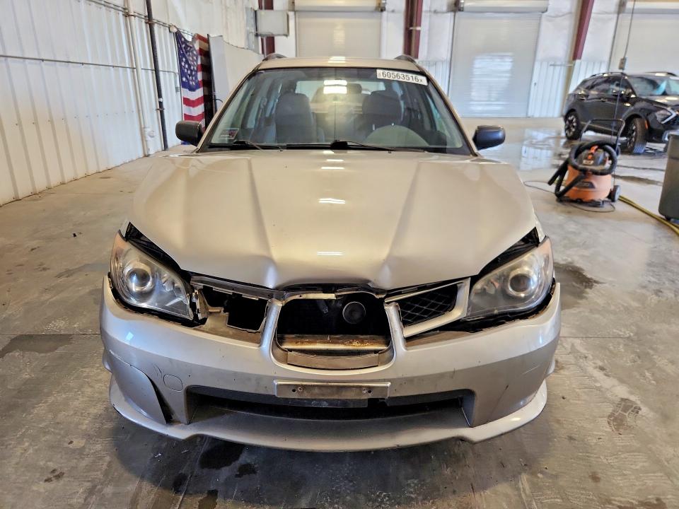 2006 Subaru Impreza VIN JF1GG67676H809163 COPART salvage auction — FRONT END, MN - CERT OF TITLE-PRIOR SALVAGE, sold $525 on 2026-07-28 (photo 5)