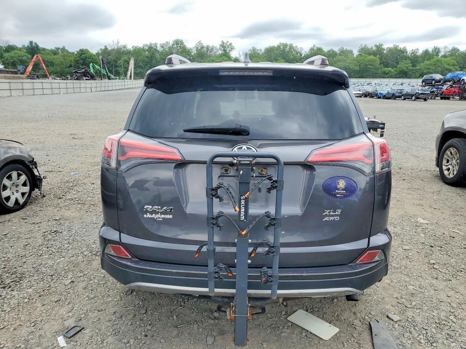 2018 Toyota Rav 4 VIN JTMRFREV4JJ246219 COPART salvage auction — SIDE, Fl - Cert Of Title-Salvage Theft, sold $7,300 on 2026-07-17 (photo 6)