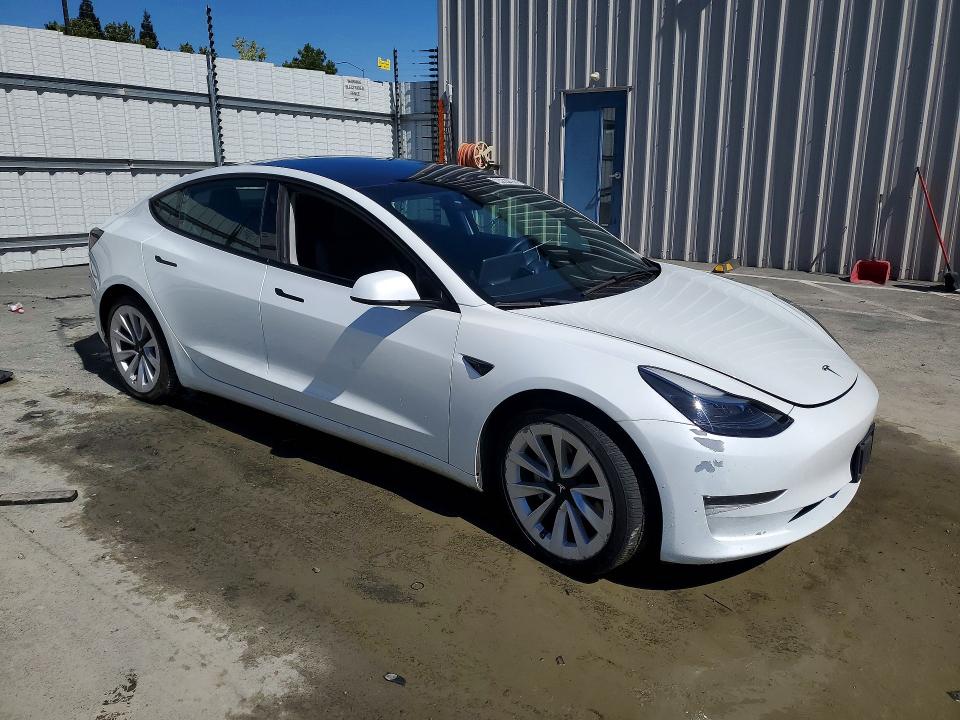 2023 Tesla Model 3 VIN 5YJ3E1EA7PF460032 COPART salvage auction — MECHANICAL, CA - CERTIFICATE OF TITLE, sold $8,200 on 2026-07-22 (photo 4)