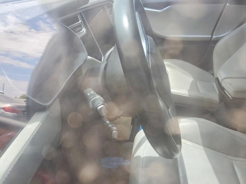 2015 Tesla Model s VIN 5YJSA1E19FF116174 COPART salvage auction — MINOR DENT/SCRATCHES, Nv - Certificate Of Title, sold $1,750 on 2026-07-27 (photo 9)