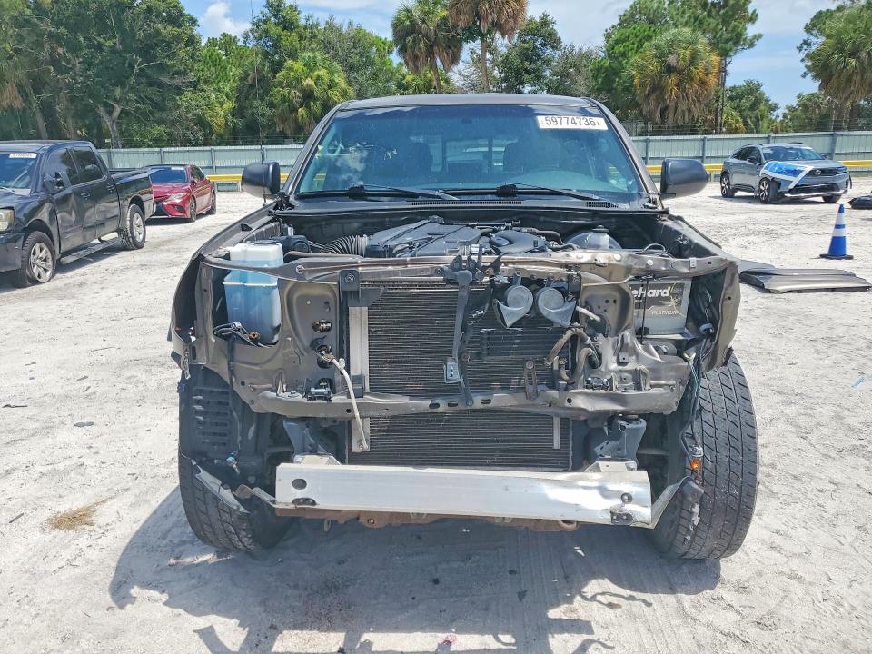 2014 Toyota Tacoma VIN 5TFKU4HNXEX005337 COPART salvage auction — FRONT END, Fl - Cert Of Title Slvg Rebuildable, sold $100 on 2026-07-29 (photo 5)