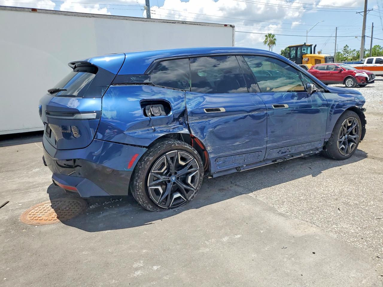 2024 BMW iX VIN WB523CF06RCR08663 COPART salvage auction — Side, FL - CERTIFICATE OF DESTRUCTION, sold $20,100 on 2026-08-28 (photo 3)