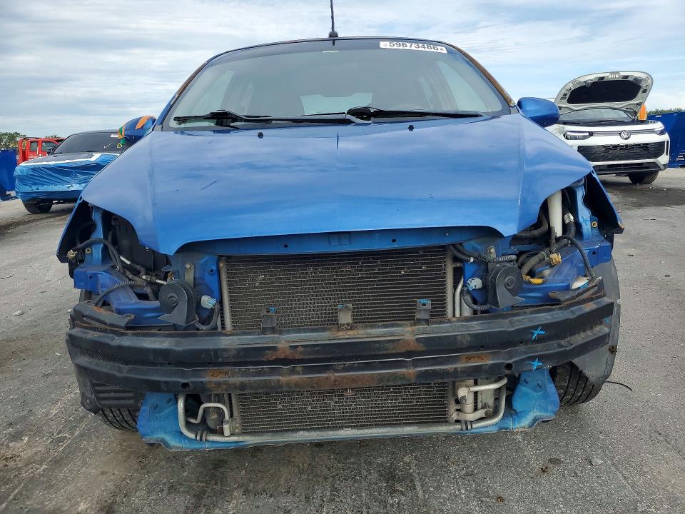 2009 Chevrolet Aveo VIN KL1TD66E89B356714 COPART salvage auction — FRONT END, FL - CERT OF TITLE SLVG REBUILDABLE, sold $375 on 2026-07-14 (photo 5)