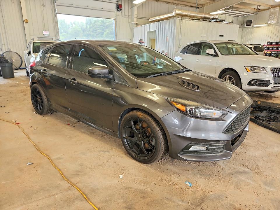 2015 Ford Focus VIN 1FADP3L97FL373252 COPART salvage auction — MINOR DENT/SCRATCHES, Mn - Non Public Clean Title, sold $2,850 on 2026-07-23 (photo 4)