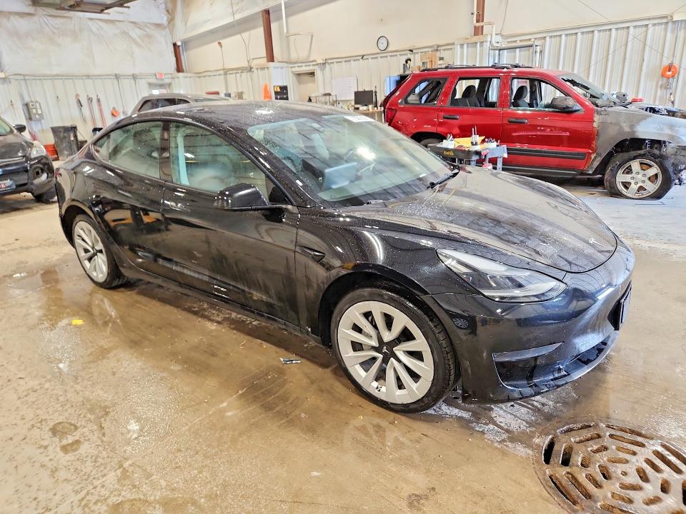 2022 Tesla Model 3 VIN 5YJ3E1EA3NF304034 COPART salvage auction — REAR END, Il - Certificate Of Title, sold $11,000 on 2026-07-22 (photo 4)